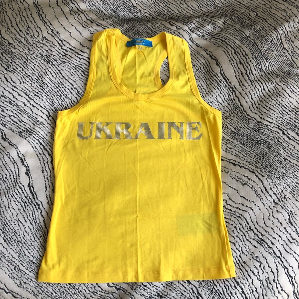 Ukraine Sport Tank very shinny letters in person. Fits like a medium. Like new!
